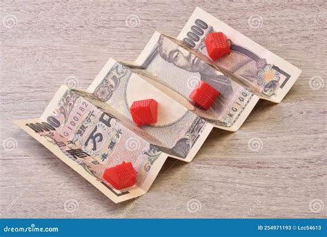 Houses and Japanese Yen Banknote Stock Image - Image of fold, bankruptcy: 254971193