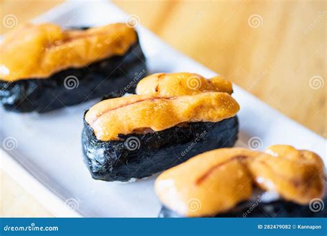 Uni Sushi on a White Plate. Sea Urchin(uni Sashimi), Japanese Food Stock Photo - Image of ...