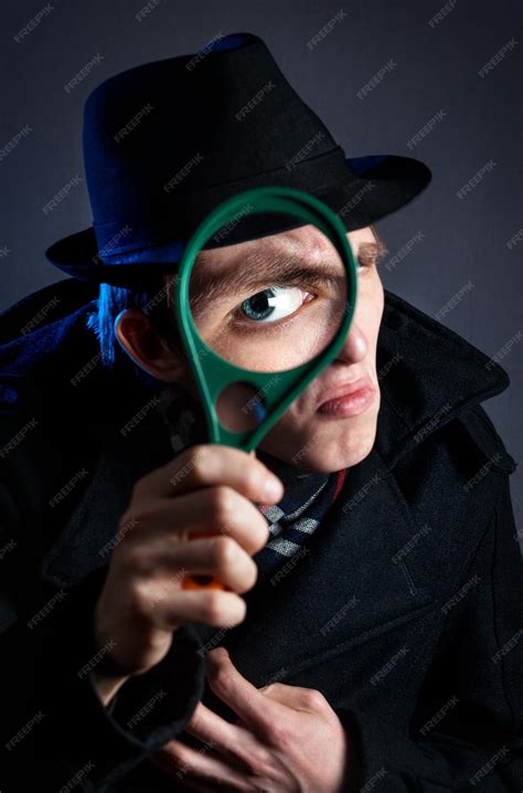 Premium Photo | Detective with magnifier glass