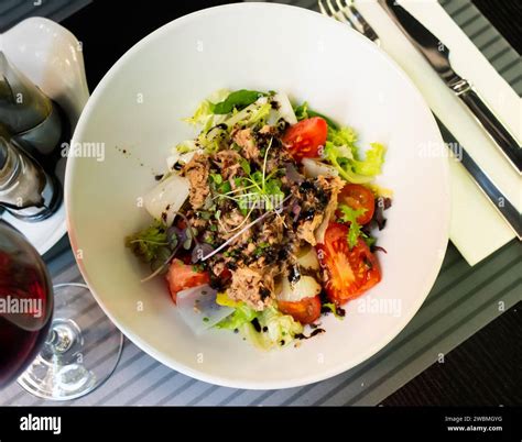 Spanish tuna salad with confit leek and modena Stock Photo - Alamy