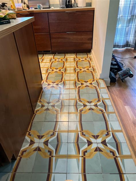 Heated Tile floors are impossible to maintain in the kitchen. I am ...