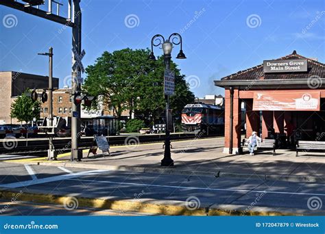 Metra Commuter Train Passes Freight Train East Of Joliet Editorial ...