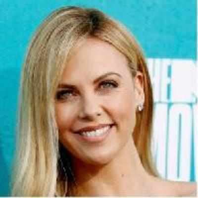 Charlize Theron fuming over Stewart-Sanders affair | English Movie News ...