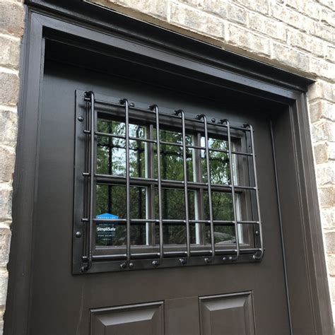 Custom wrought iron window guards for your home & business | Signature ...