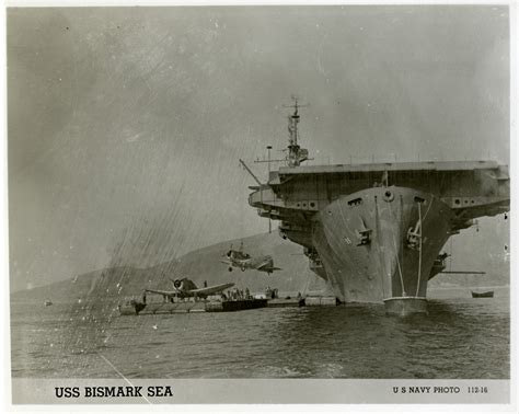 Bombers being loaded onto the USS Bismarck Sea | The Digital ...