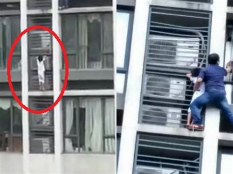 Super Dad Rescues 7-YO Son Who Jumped Off 8th Floor Balcony To Escape ...