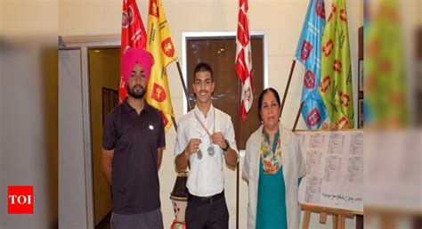 Swimmer grabs two gold medals | Events Movie News - Times of India