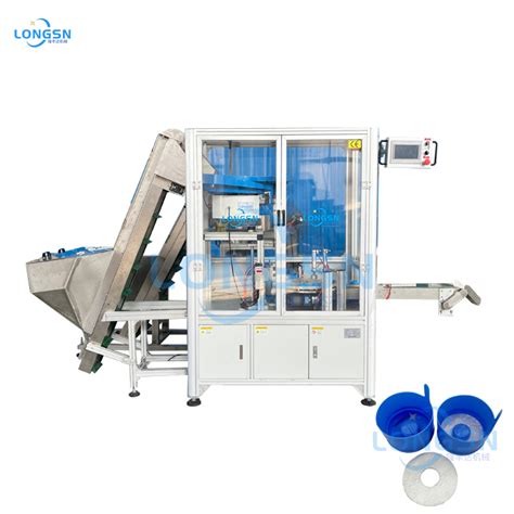 Image result for Automatic Cap Lining. Machine