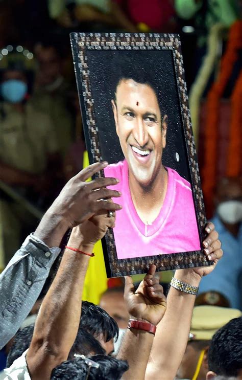 Grieving Crowds Bid Goodbye To Puneeth Rajkumar - Rediff.com movies