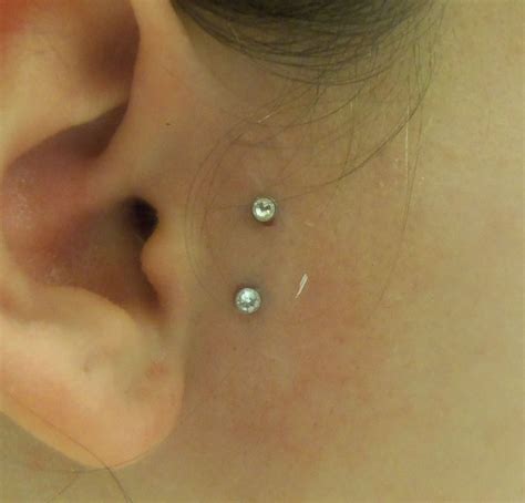 Double Ear Dermal | Cool ear piercings, Dermal piercing, Cute ear piercings
