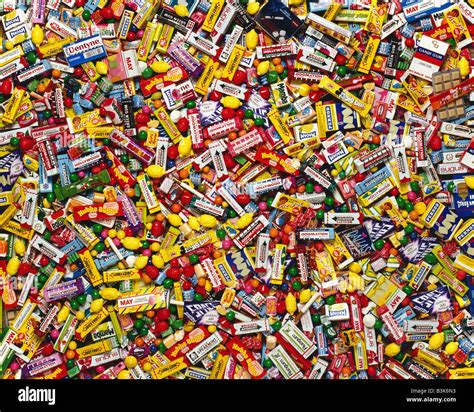 BACKGROUND WITH CHEWING GUM PACKS AND CANDIES Stock Photo - Alamy