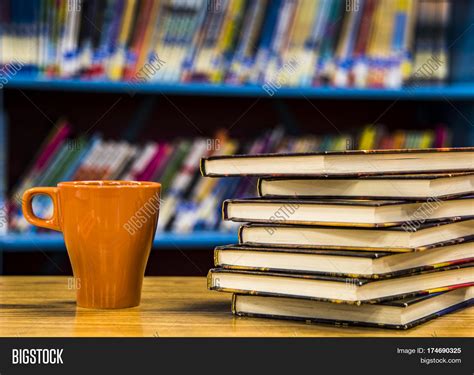 Stack Of Books On A Desk