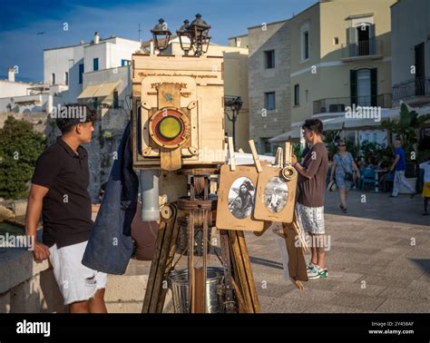 A Pix in a Box large format wooden plate camera offering tourists ...