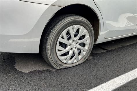 ‘The cars were just like leaning to the left’: Some 20 vehicles had tires slashed in this ...