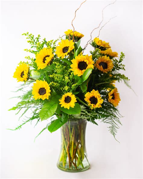 An abundent sunflower floral arrangement perfect for fall celebrations ...