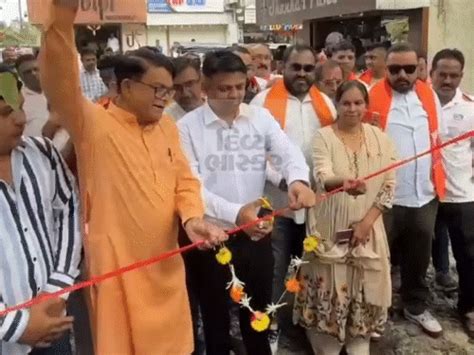 MP arrives with JCB to inaugurate Valsad Railway Colony Road