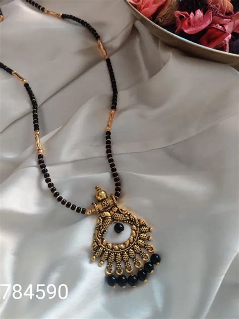Binni's Wardrobe Gold-Plated Black Beaded Mangalsutra Price in India ...