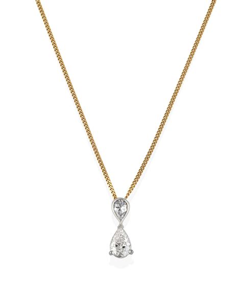 Lot 2397 - A Diamond Pendant on Chain