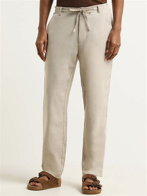 Buy ETA Beige Mid Rise Cotton Blend Relaxed Fit Trousers from Westside
