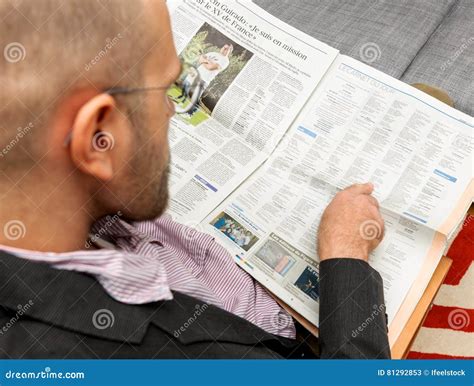 Man Reading Obituaries in Newspaper Editorial Stock Photo - Image of ...