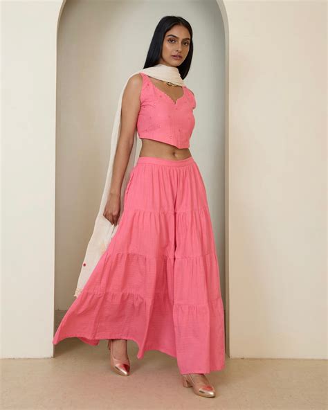 Shop Peach pink mirror work full flared skirt set online at ...