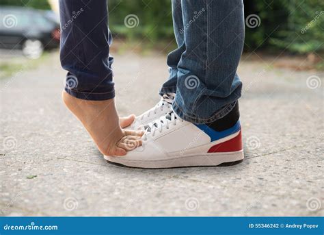Kissing couple feet s stock photo. Image of female, love - 55346242