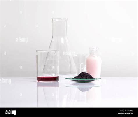 Cosmetic chemicals ingredient on white laboratory table. Potassium Permanganate Liquid, KMnO4 ...