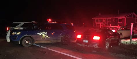 Two Michigan State Police troopers injured after being struck by ...