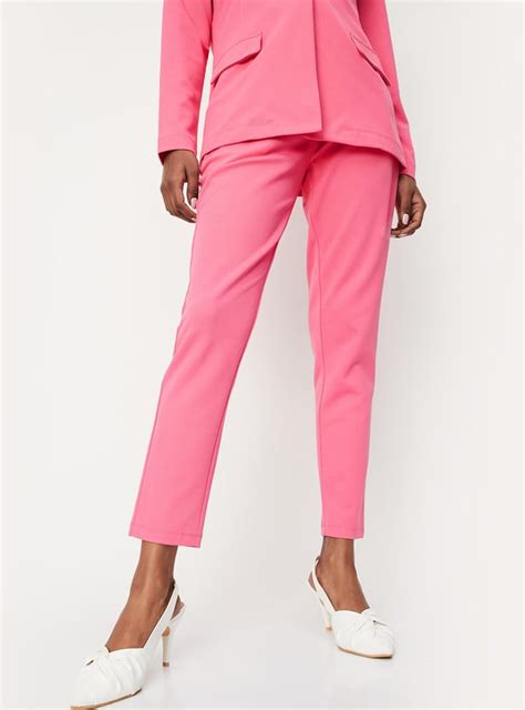 Buy Women Solid Waist Tie-Up Peg Trousers Online at just Rs. 999.0 ...