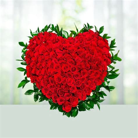 Send 100 roses heart shaped basket Online | Phoolwala