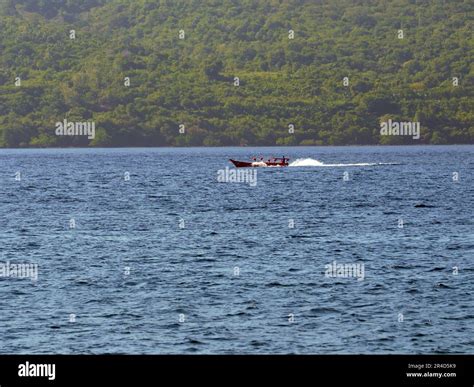 Maumere, Indonesia-May 23, 2023: An inter-island ferry in Indonesia is sailing from the port of ...