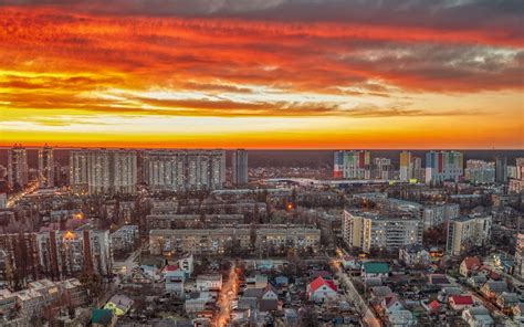 Download wallpaper 3840x2400 city, aerial view, buildings, sunset ...