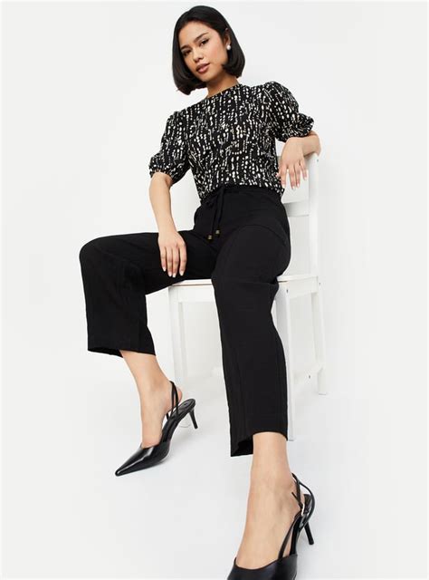 Buy Women Textured Wide-Leg Trousers Online at just Rs. 1199.0 ...