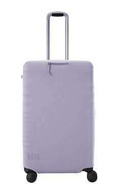 BEIS The Medium Check-in Luggage Cover in Lavender | REVOLVE