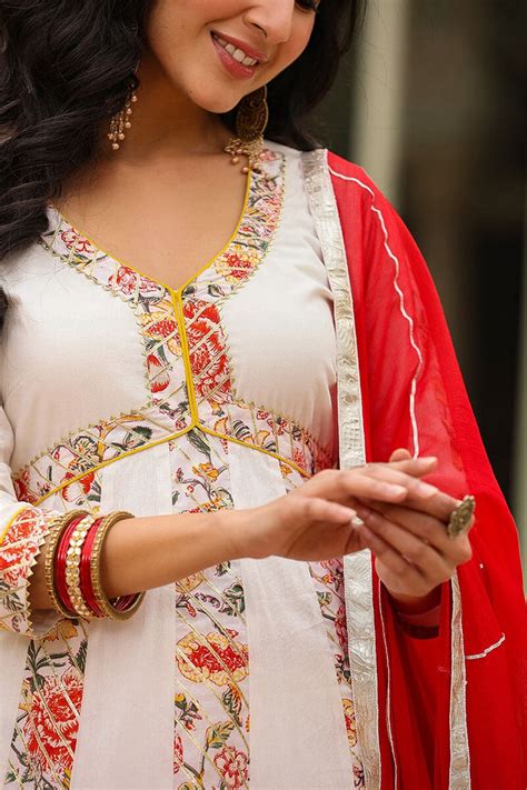 Eira White Alia Cut Paneled Long Flared Kurta With Pant And Dupatta ...