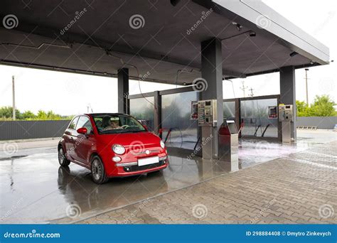 Woman Working at the Car Wash and Washing the Car Stock Photo - Image of work, washing: 298884408
