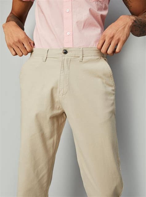 Buy Men Solid Stretchable Slim Fit Chinos Online at just Rs. 1399.0 ...