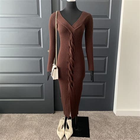 Long chocolate brown knit dress. This is made of a... - Depop