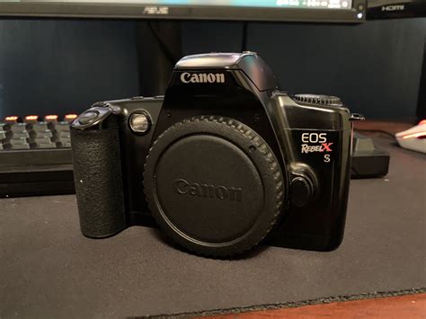 Picked up my first Canon SLR for $5 today. What lens should I start ...