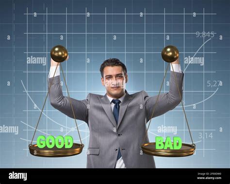 The businessman choosing between good and bad Stock Photo - Alamy