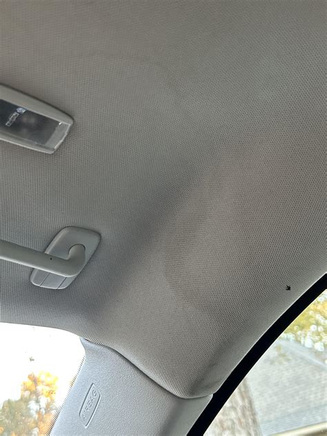 My roof leaks at my passenger visor when I wash my car…any idea why? Discoloration is from water ...