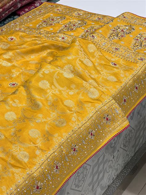 Yellow Banarasi Tissue Silk Hand Embroidery Saree