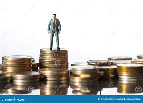 Heights Of Success Miniature Man Standing On Money, Illustrating A ...