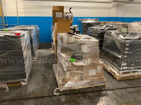 3 SKIDS OF MISC PERIPHERALS (KEYBOARDS,MICE,WIRE,BAGS,MONITOR STANDS ...