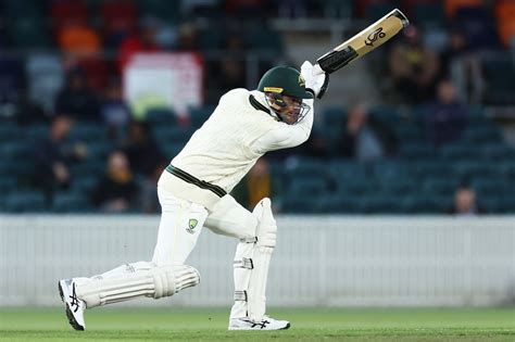 Peter Handscomb drives one through covers during his 55-run stand ...