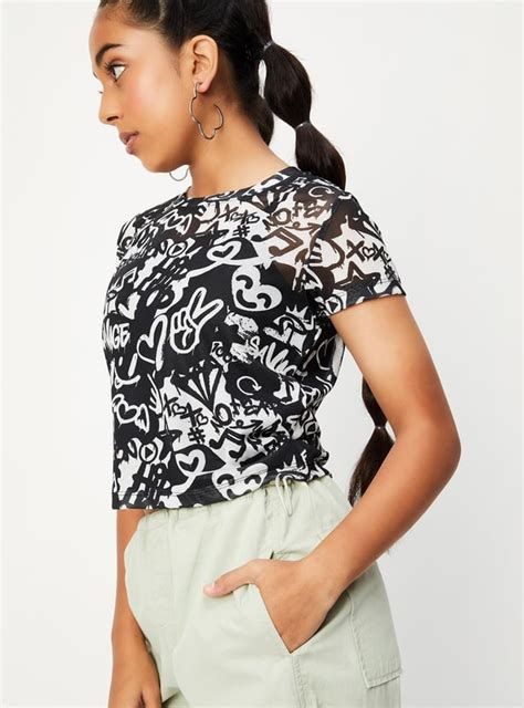 Buy Girls Graffiti Printed Crop T-shirt Online at just Rs. 399.0 ...