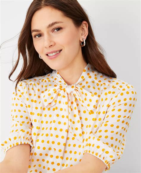 Dotted Half Placket Tie Neck Blouse