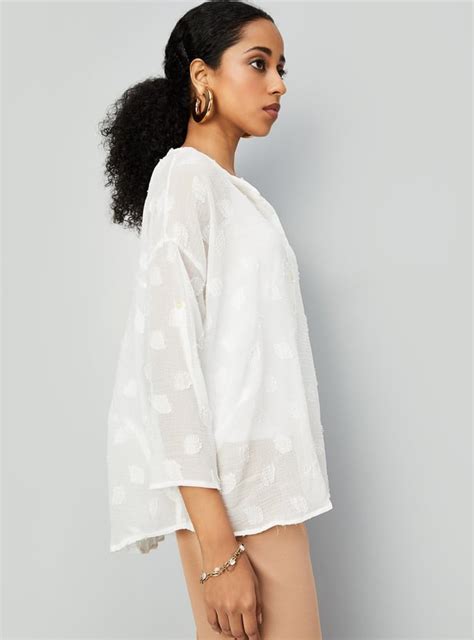 Buy Women Textured Notched Neck Top Online at just Rs. 799.0 ...