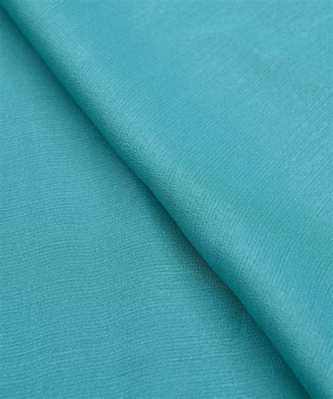Buy Sea Green Plain Dyed Simmer Chiffon Fabric Online at Wholesale ...