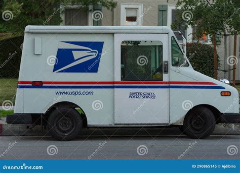U.S. Postal Service (USPS) trucks are parked at a post office on August 23, 2024 in Glendale, Califo